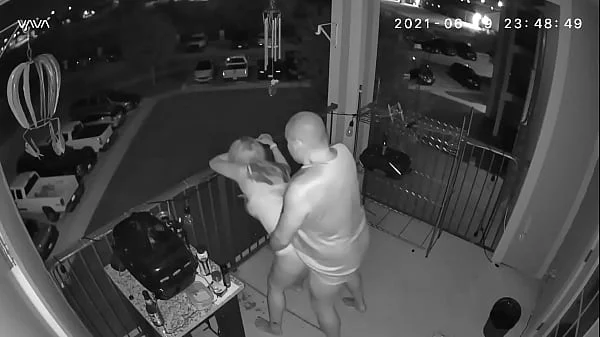 Couple caught on the balcony